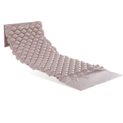 Surmatelas anti-escarres avec compresseur